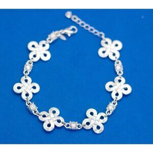 8 inch, Vintage Silver Tone Flower Spiral Diamond Rhinestone Bracelet by Avon D1